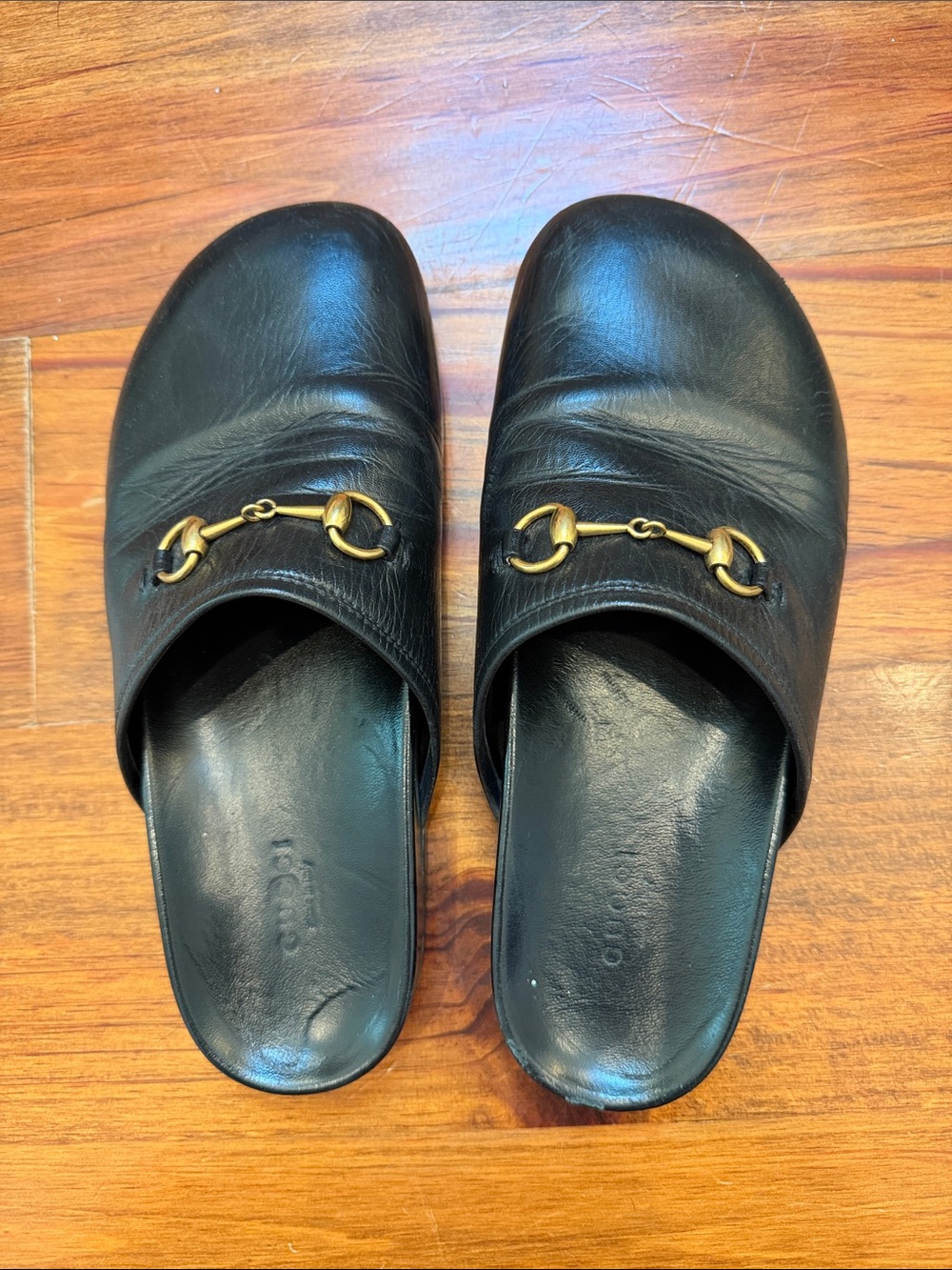 Gucci Black Leather Horsebit Mules with Gold Hardware